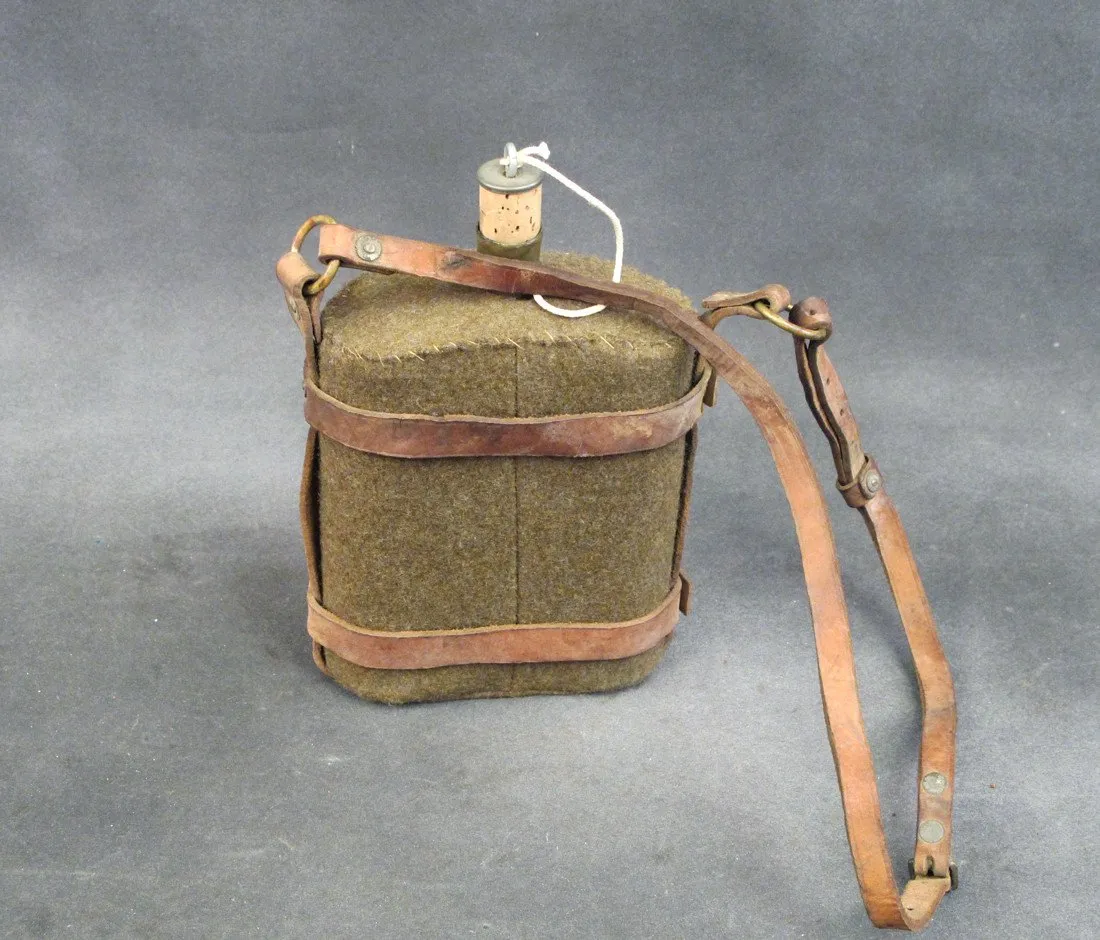 Original British Army Water Bottle in Leather Skeletal Carrier