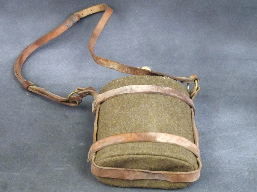 Original British Army Water Bottle in Leather Skeletal Carrier